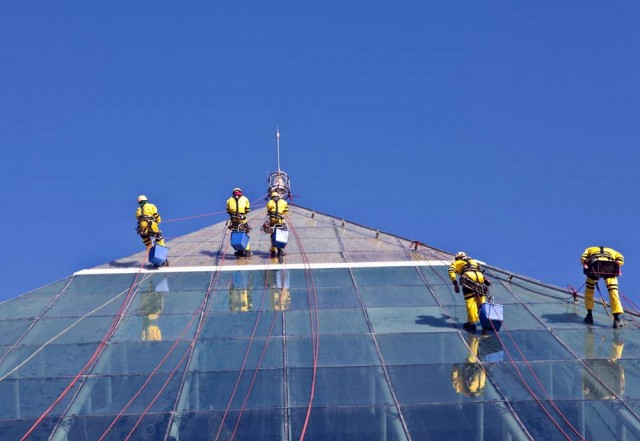 PHOTOS: Cleaning crew climb Raffles Dubai hotel-4